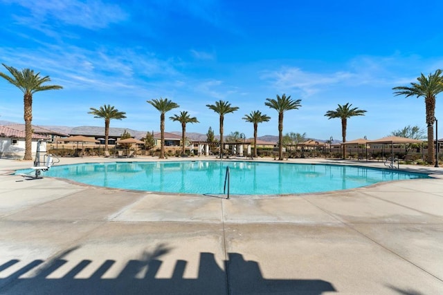 community pool with a patio