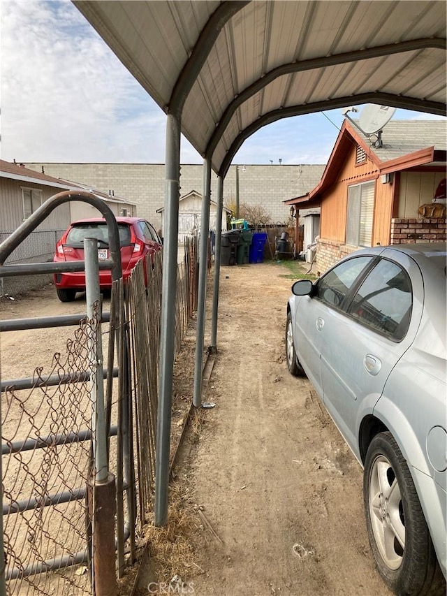 exterior space with a carport