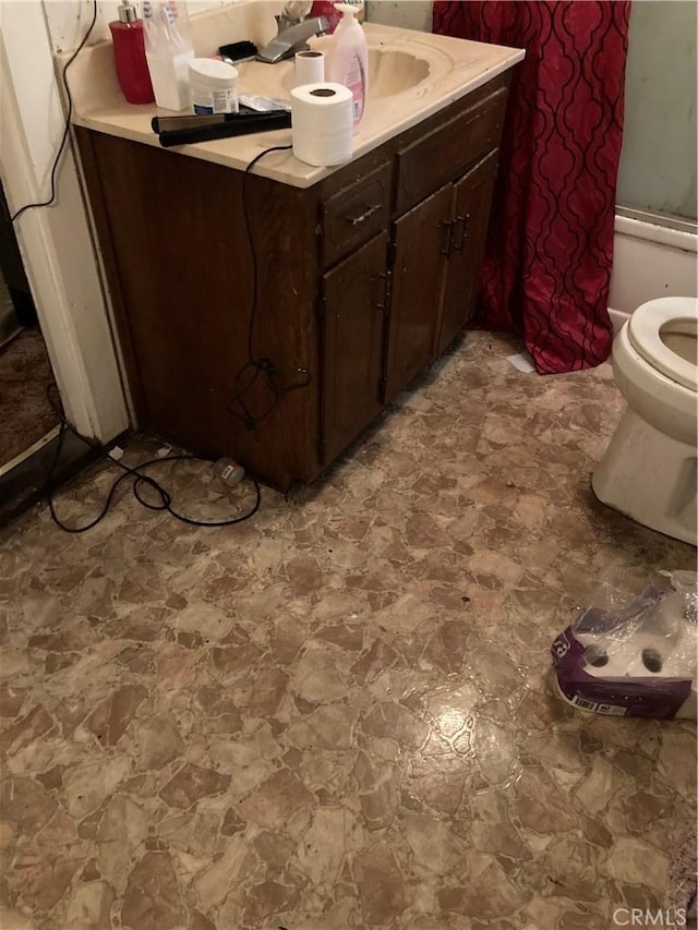 full bathroom with vanity, toilet, and shower / bathtub combination