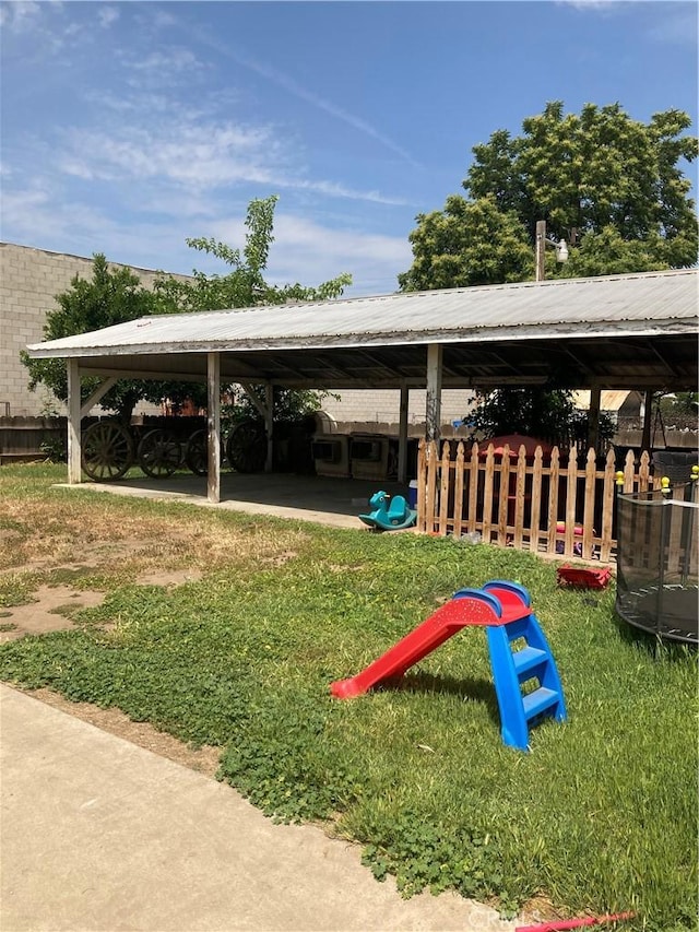 surrounding community featuring a lawn