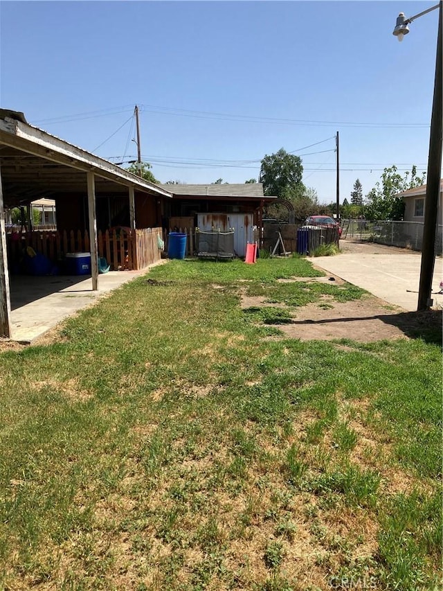 view of yard with fence