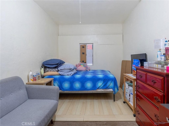 bedroom featuring electric panel