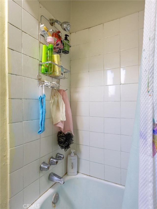 full bathroom with shower / bath combination with curtain