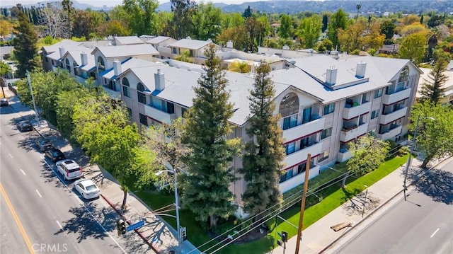 birds eye view of property with a residential view