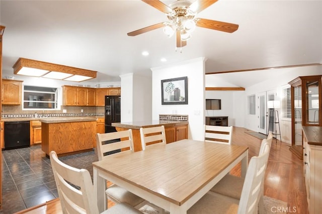 dining space with lofted ceiling, ceiling fan, and recessed lighting