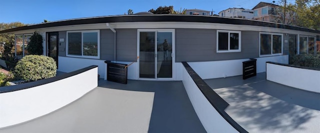 rear view of property with a patio