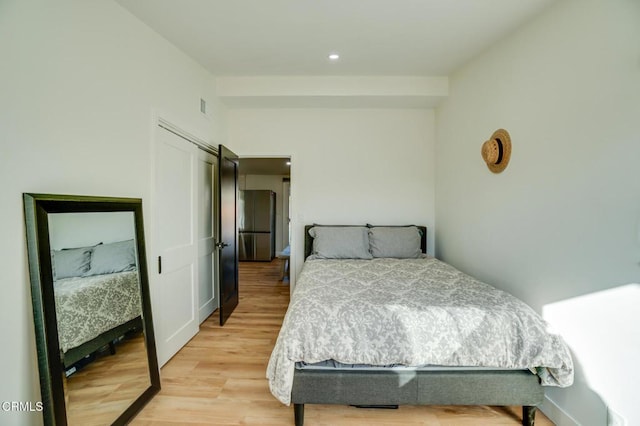 709 Greenbank Ave, Duarte, CA 91010 - bedroom with light wood finished floors, visible vents, and recessed lighting