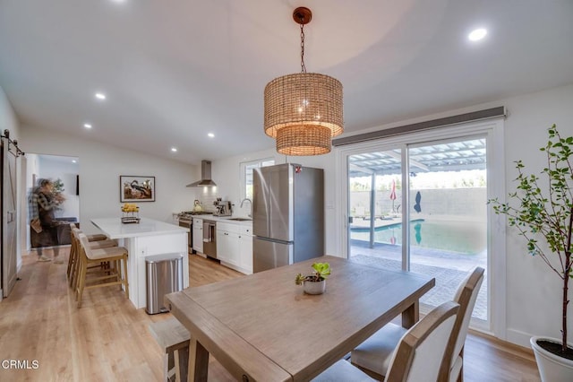 709 Greenbank Ave, Duarte, CA 91010 - dining space featuring light wood-type flooring, lofted ceiling, and recessed lighting