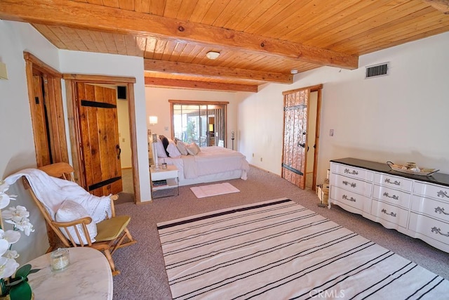 carpeted bedroom featuring visible vents, wooden ceiling, and beam ceiling