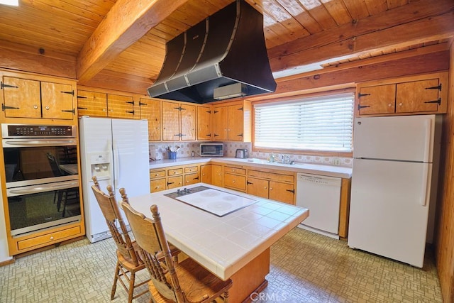 kitchen with wall chimney range hood, white appliances, tile countertops, and wooden ceiling