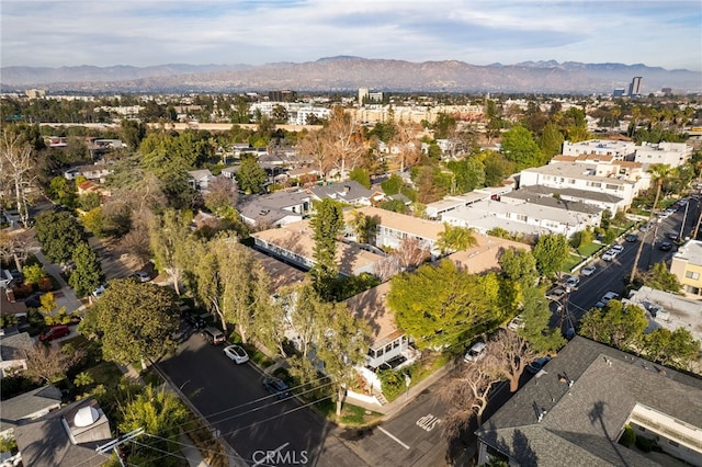 drone / aerial view with a residential view and a mountain view