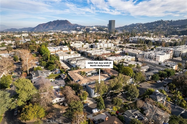 drone / aerial view featuring a mountain view