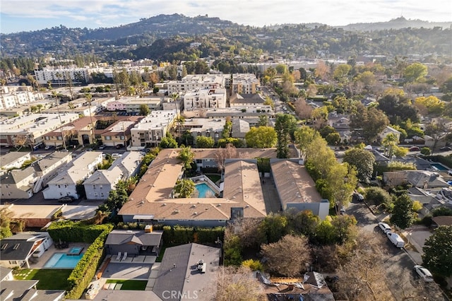 birds eye view of property with a residential view and a mountain view