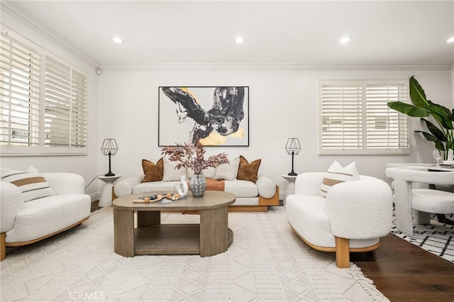 living room with recessed lighting and crown molding