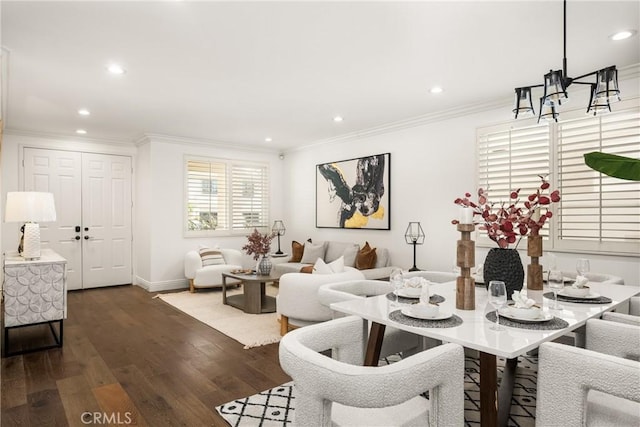 dining space with ornamental molding, recessed lighting, and wood finished floors