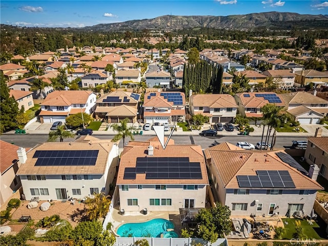 bird's eye view featuring a residential view and a mountain view