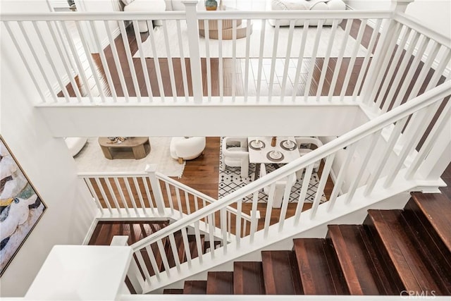 stairs with wood finished floors