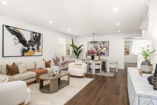 living area with dark wood-style floors, ornamental molding, and recessed lighting