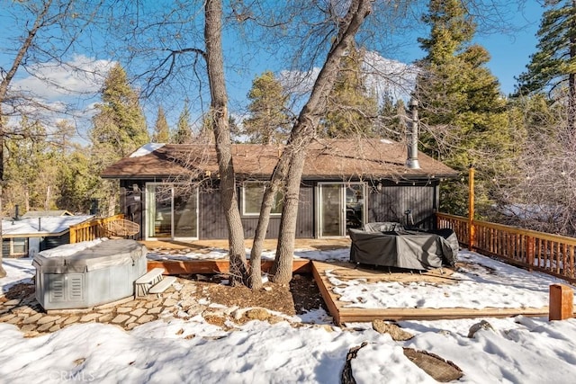 43121 Grizzly Rd, Big Bear Lake, CA 92315 - snow covered rear of property with a deck
