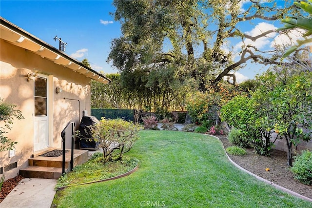 view of yard featuring fence