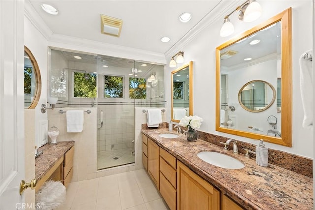 bathroom with ornamental molding and a sink