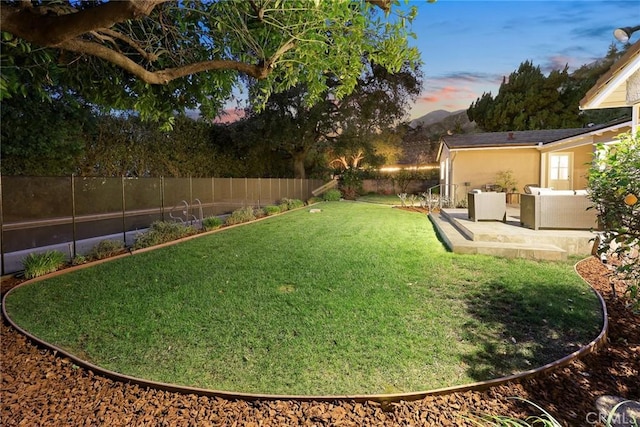 view of yard with a patio area and a fenced backyard