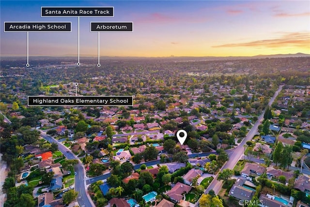 birds eye view of property with a residential view