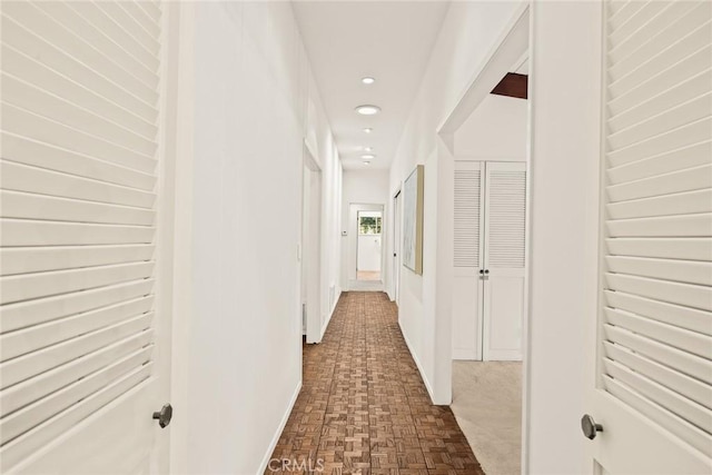 corridor featuring recessed lighting