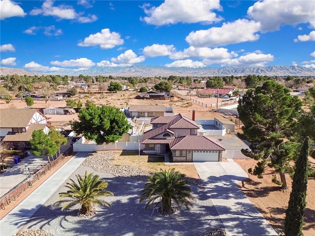 birds eye view of property with a residential view and a mountain view