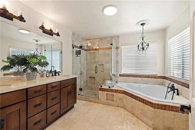 full bathroom with a garden tub, double vanity, a sink, a shower stall, and tile patterned floors