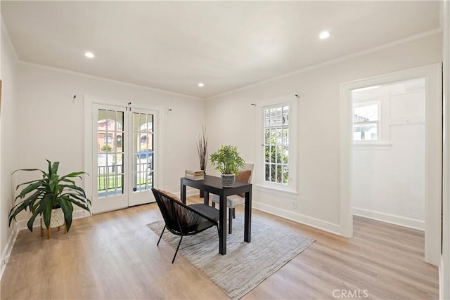 dining space featuring baseboards, ornamental molding, recessed lighting, and light wood-style floors