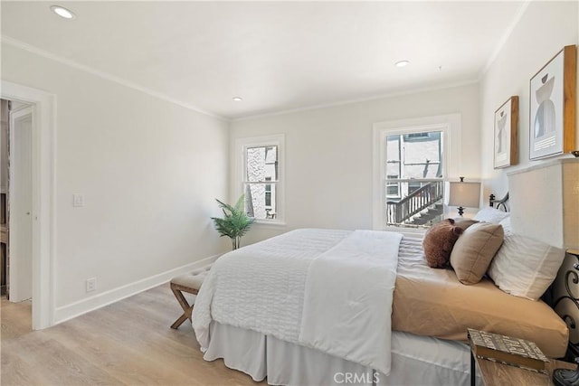 bedroom with ornamental molding, light wood-type flooring, recessed lighting, and baseboards