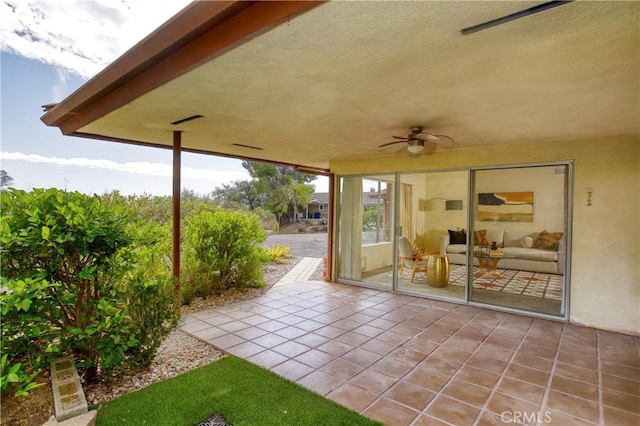 view of patio / terrace featuring a ceiling fan