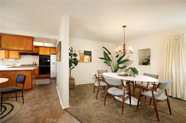 dining area with a chandelier