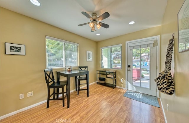 dining area with light wood finished floors, ceiling fan, baseboards, and recessed lighting