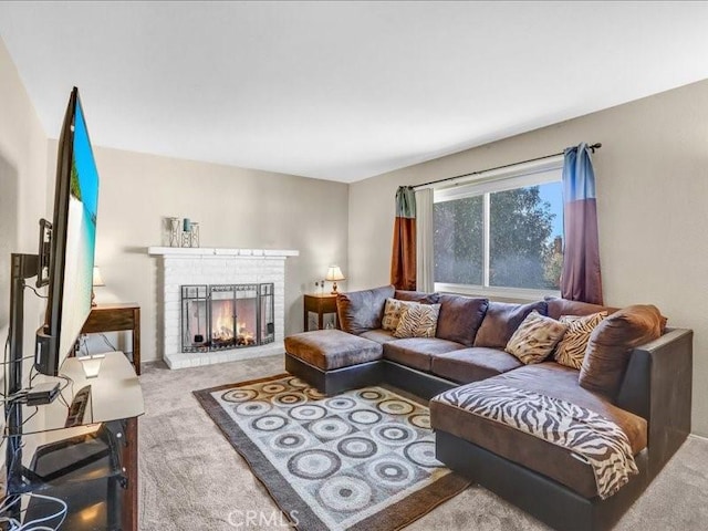 living room featuring light carpet and a fireplace