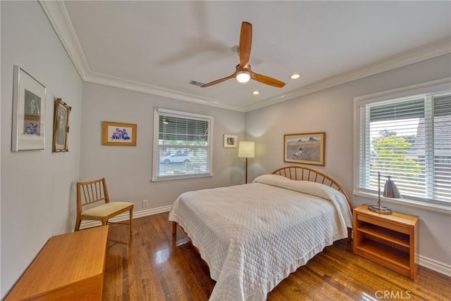 bedroom with dark wood-style floors, recessed lighting, visible vents, ornamental molding, and baseboards