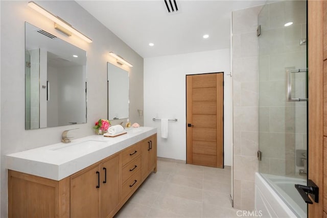 full bath featuring recessed lighting, visible vents, a sink, and double vanity