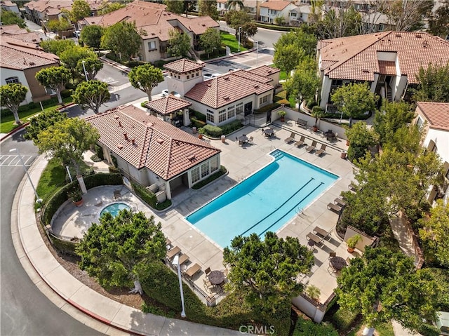 birds eye view of property with a residential view