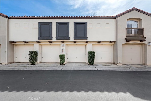 garage featuring driveway