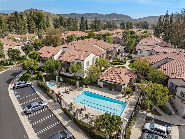 birds eye view of property featuring a residential view and a mountain view