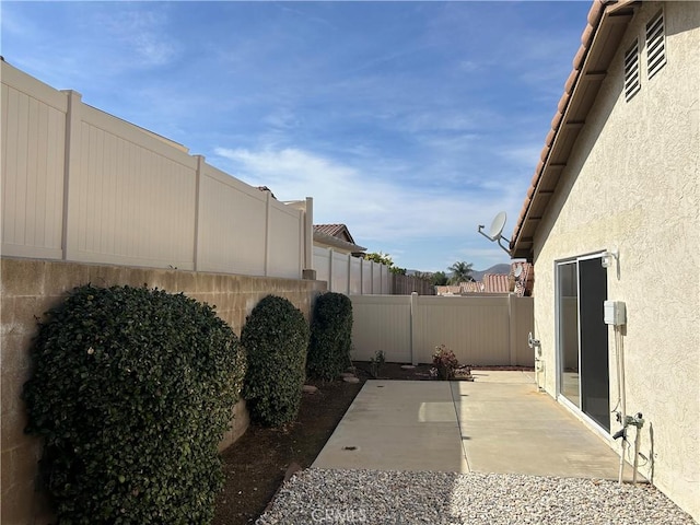 view of patio featuring a fenced backyard