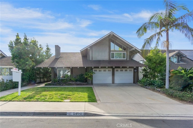 view of front of home featuring a garage, driveway, a front lawn, and a shingled roof