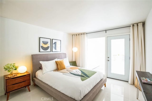 bedroom with light tile patterned flooring