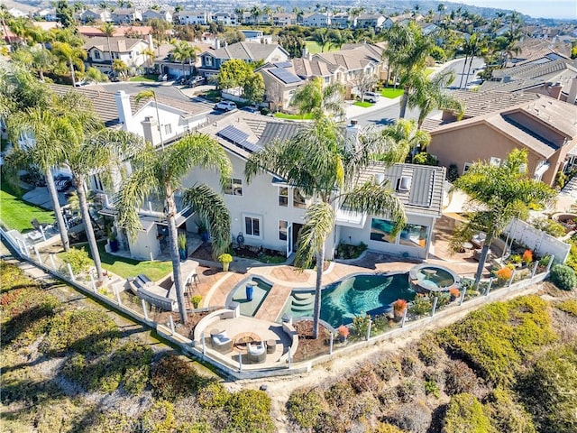 drone / aerial view with a residential view