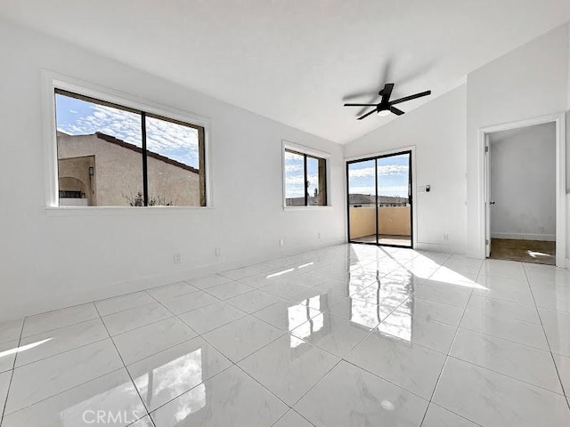 unfurnished bedroom featuring lofted ceiling, a ceiling fan, access to exterior, and baseboards