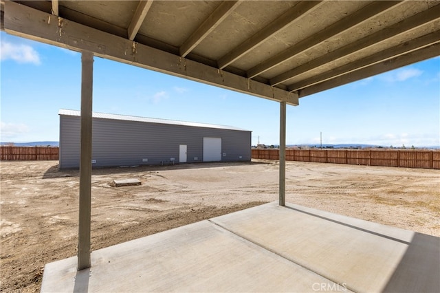 view of patio / terrace with fence