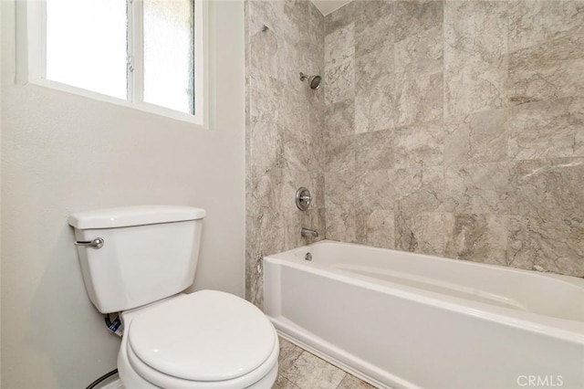 full bath featuring shower / bathtub combination and toilet