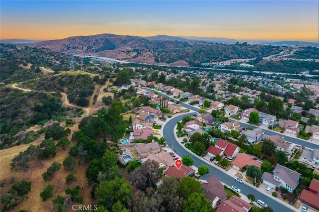 bird's eye view with a mountain view and a residential view