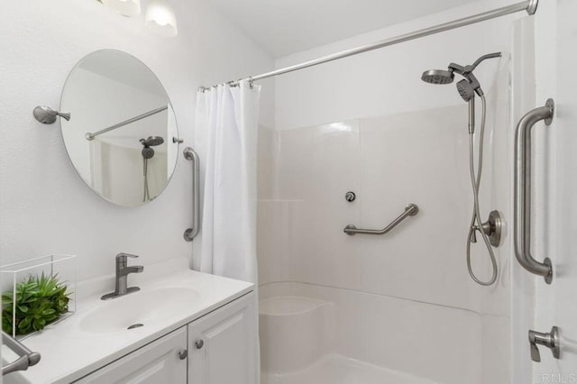 bathroom with vanity and a shower with curtain